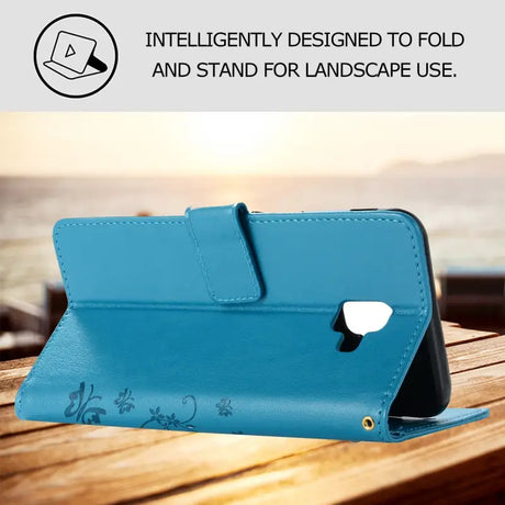 the case for the iphone 6g, with a blue leather cover