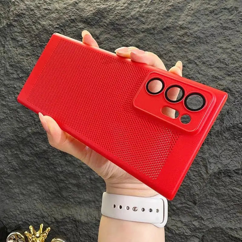 a hand holding a red case with a pair of glasses