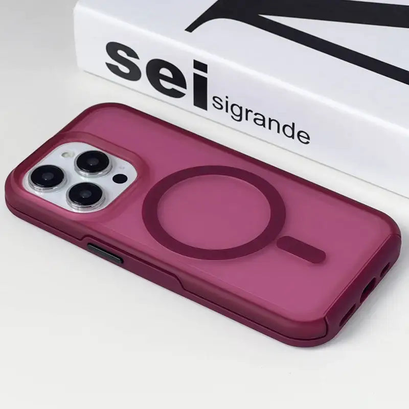 The case is pink and has a circular design