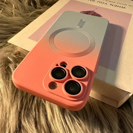 The case is pink and has two black lenses