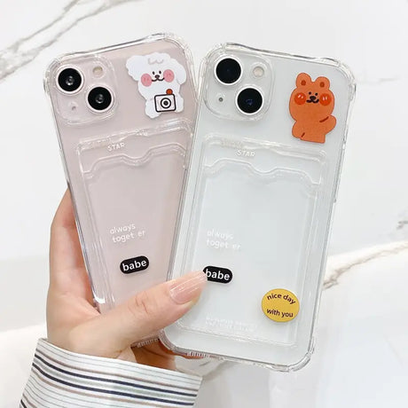 a person holding a phone case with a bear on it