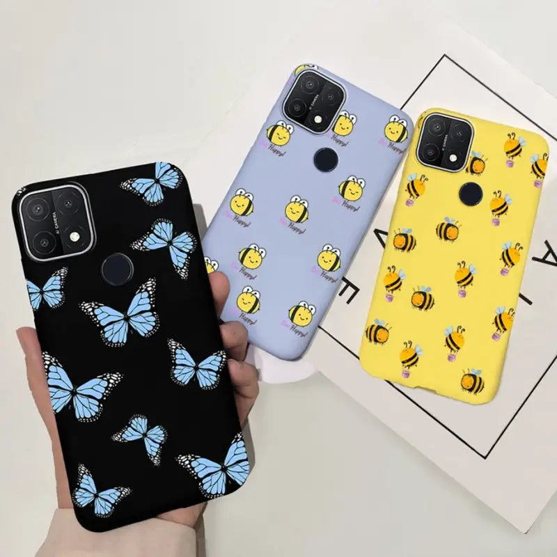 two cases with bees and bees on them