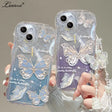 two cases with butterflies and a quote on them