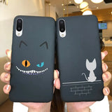 two people holding up their iphone cases with a cat and mouse