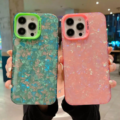 two cases with glitter and glitter glitter on them