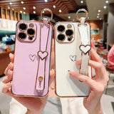 two women holding up their iphone cases