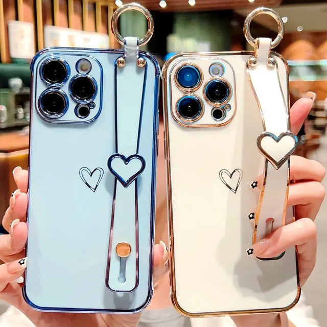 two cases with heart charms on them