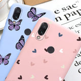 two cases with hearts and butterflies on them