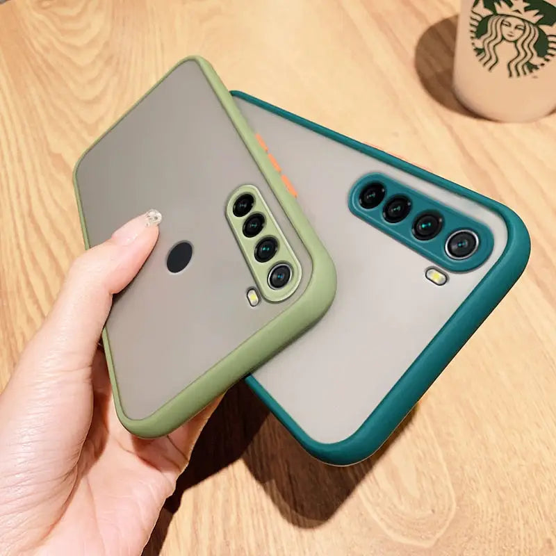 two iphone cases with a green and gray case
