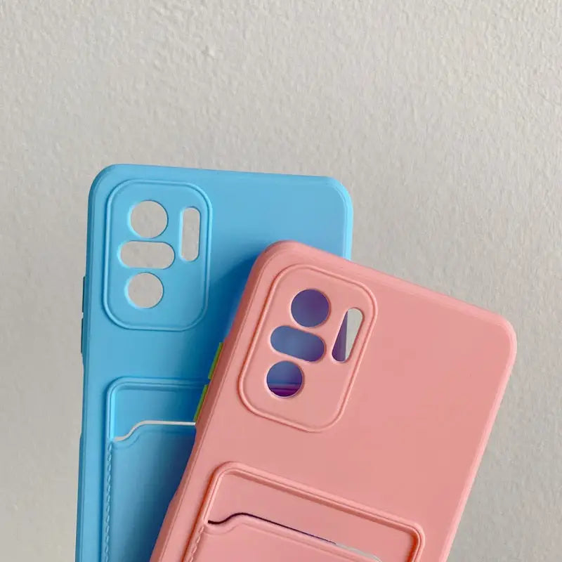 two cases with a phone holder attached to them
