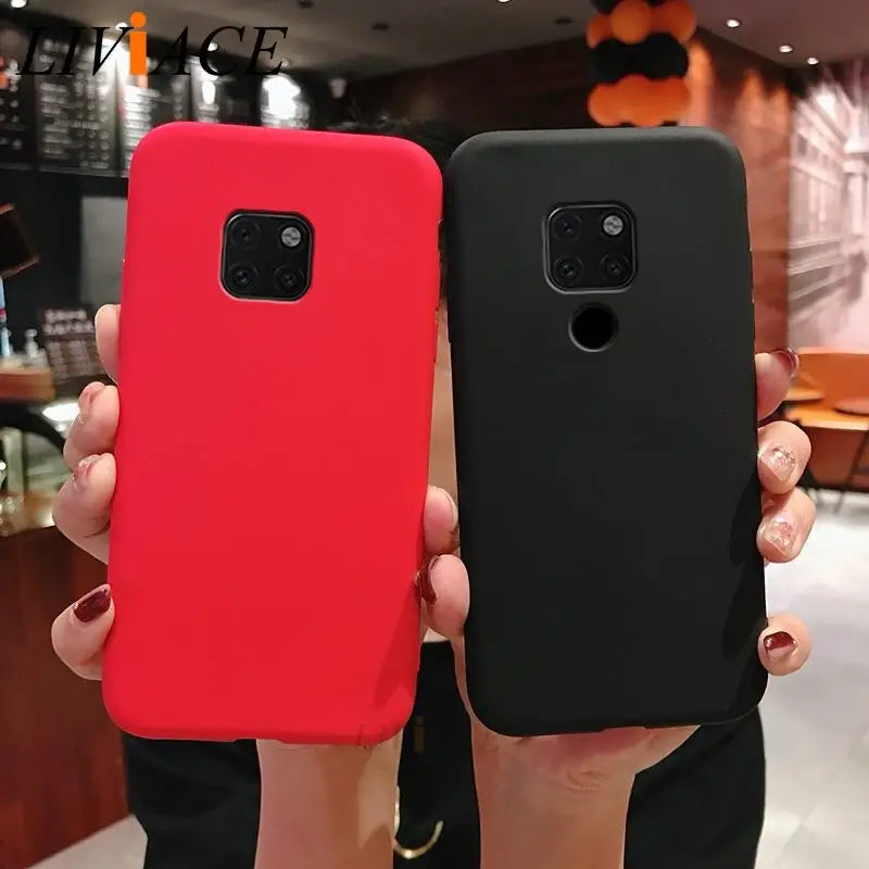 two people holding up their cell cases