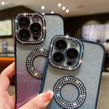 a pair of iphone cases with a diamond ring