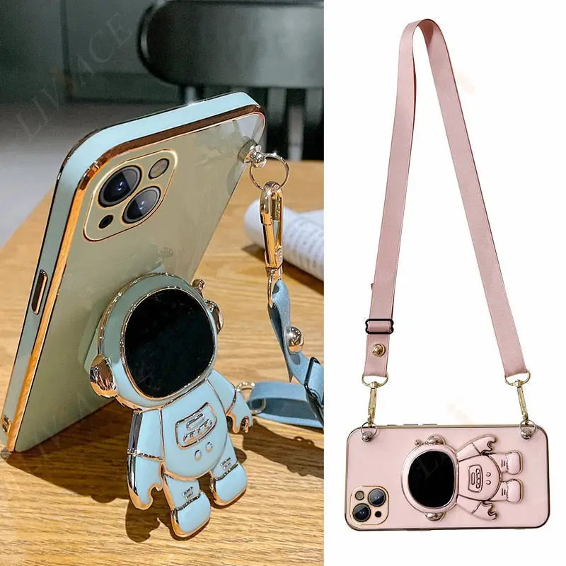 a pink phone case with a camera attached to it