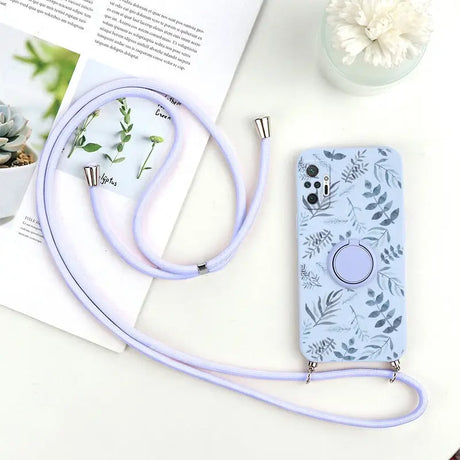 there is a cell phone case with a strap on a table
