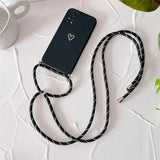 there is a cell phone that is connected to a cord