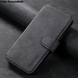 A charcoal gray faux leather wallet phone case with a magnetic strap closure.