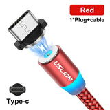 a close up of a red and blue usb cable with a light on it