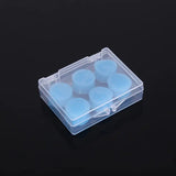 a clear plastic box with six blue plastic balls inside