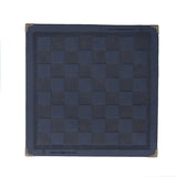 a black leather square rug with a gold trim