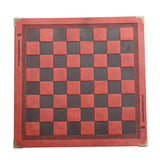 a red leather chess board with a black and white checker