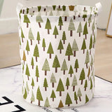 a white and green christmas tree storage bag