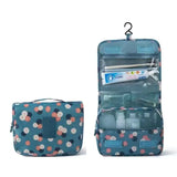 a blue and pink floral print toilet bag with a toilet bag