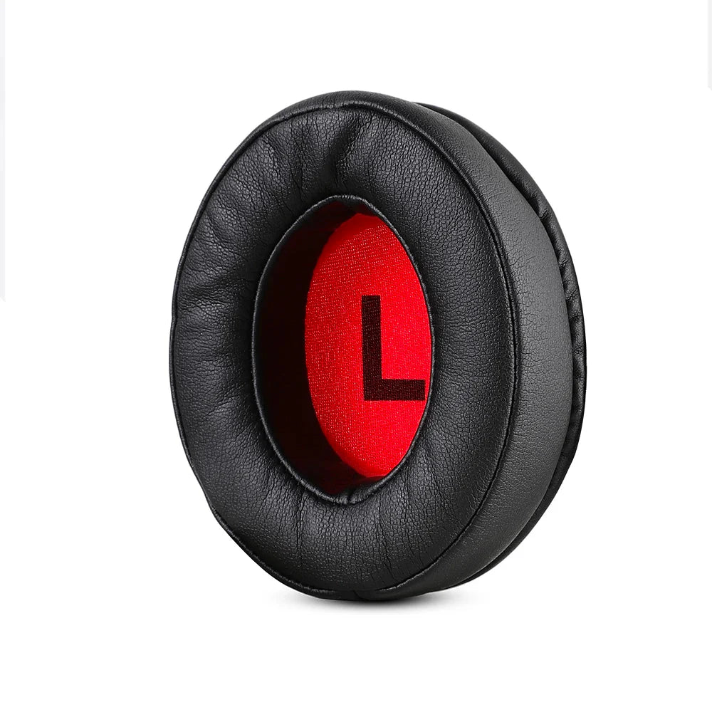 Circular black leather ear cushion with a red interior displaying the letter ’L’.