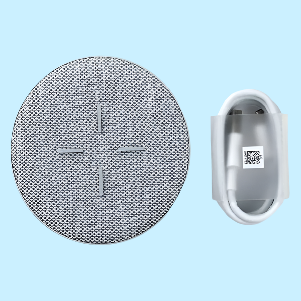 Circular gray fabric speaker cover or grille with a cross pattern in the center.