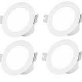 Circular white recessed light fixtures with mounting brackets.