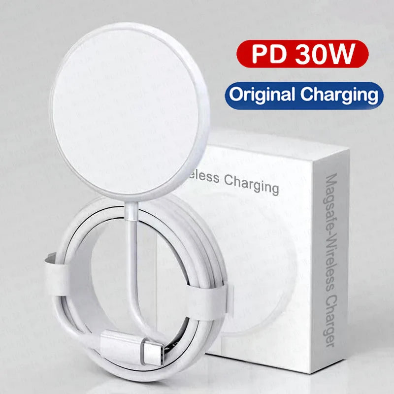 Circular white wireless charging pad with an attached cable.