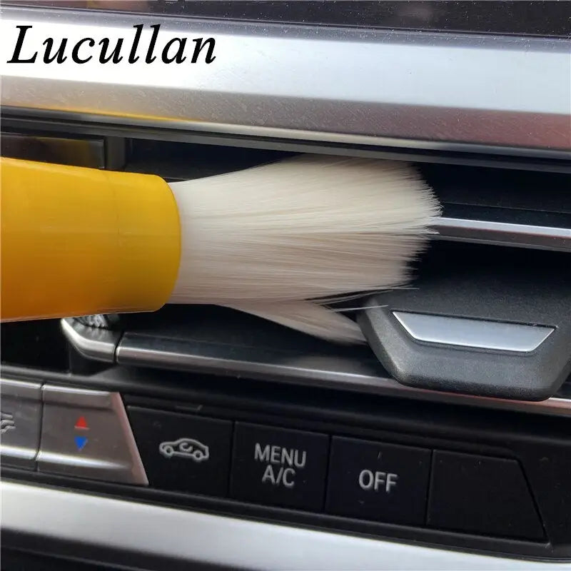 a brush is being used to clean the car’s interior