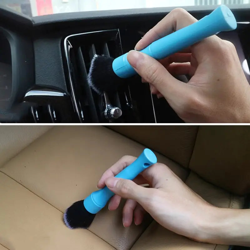 a person cleaning a car with a brush