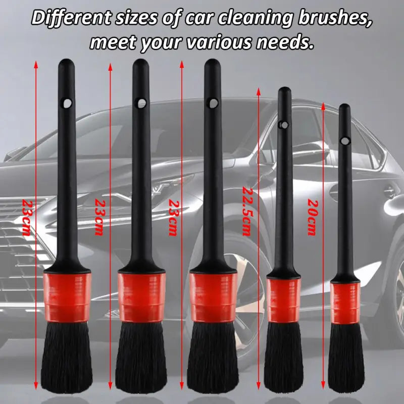 a set of three different types of car cleaning brushes