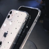a clear case with a black and white pattern on it