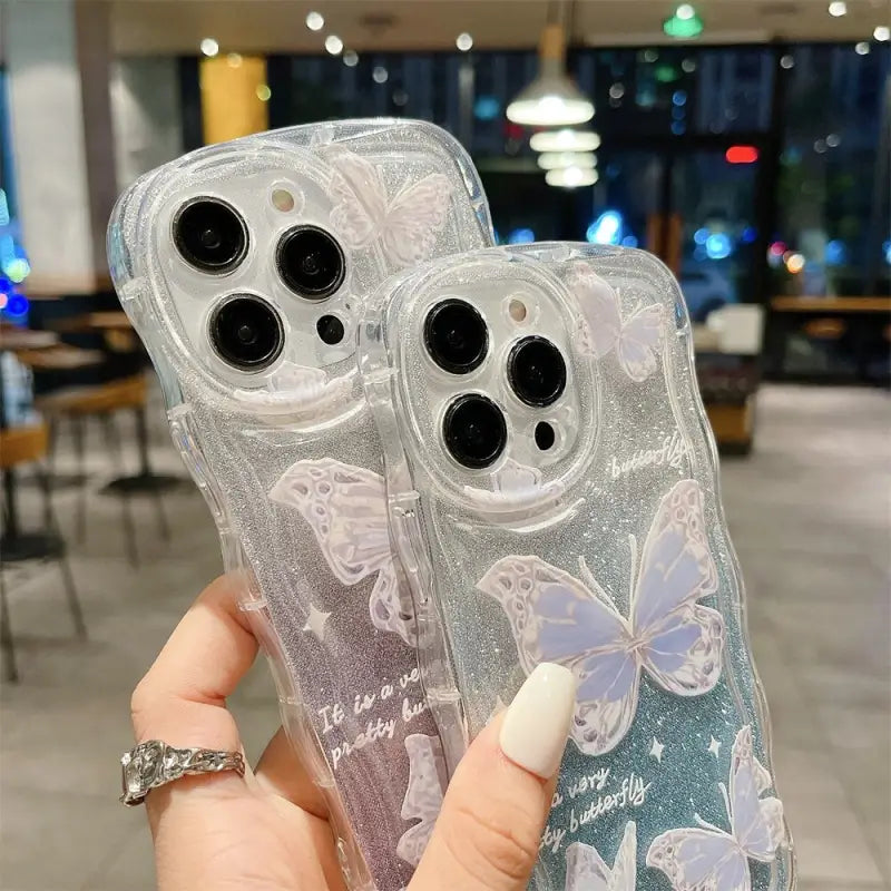 a pair of cute cartoon clear case for iphone