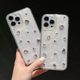 a pair of clear case with crystals
