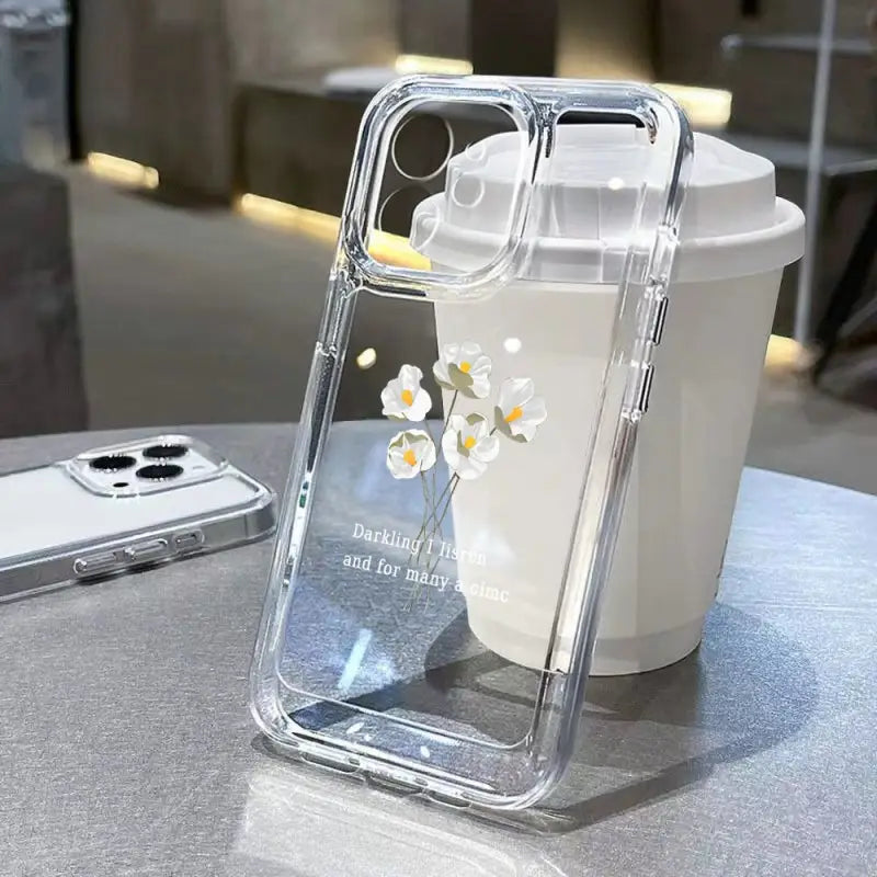 a white flower on a clear case