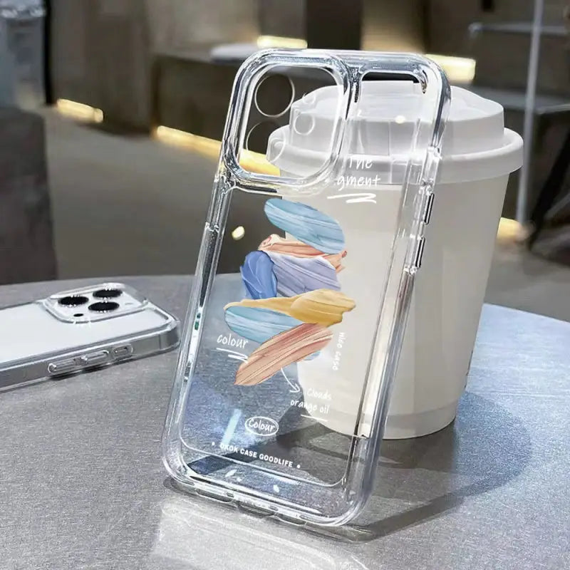 a phone case with a phone in the background