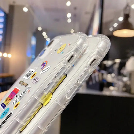 a clear case with stickers on it