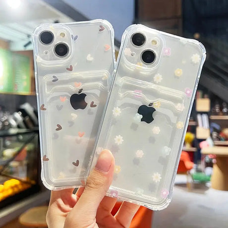 two clear cases with flowers on them