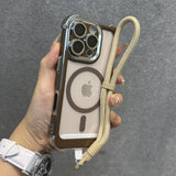 Clear iPhone case with chrome edges, a MagSafe ring, and an attached beige lanyard.