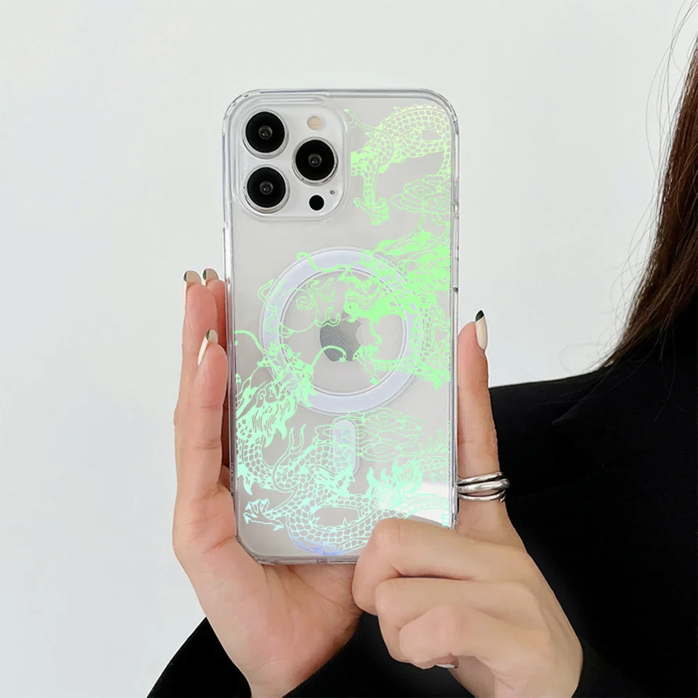 Clear iPhone case with a glowing green dragon design and a MagSafe ring.