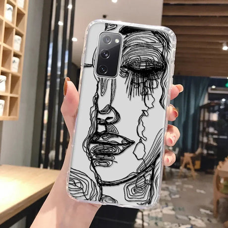 Clear phone case for samsung galaxy with black and white abstract art design featuring stylized face illustration