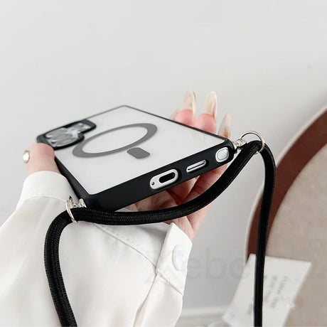 Clear phone case with black trim and lanyard.