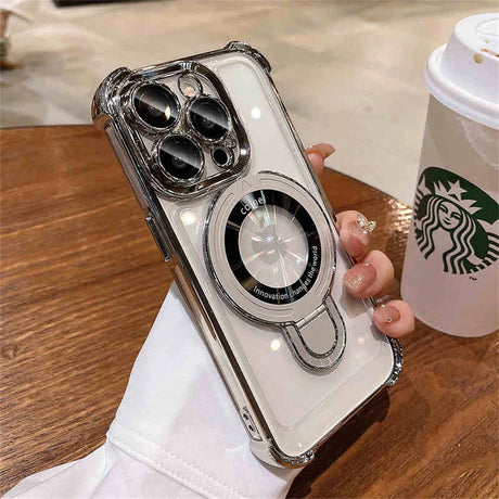 Clear phone case with metallic accents and magnetic ring.