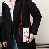 Clear phone case with red lanyard.