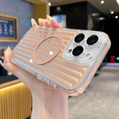A clear phone case with a ribbed peach-colored back and a circular pink MagSafe ring.
