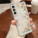 Clear transparent phone case with delicate pink peach and blue floral design for samsung galaxy back side view