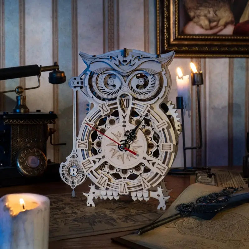 a clock with an owl face on it