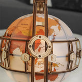 a clock made out of a globe